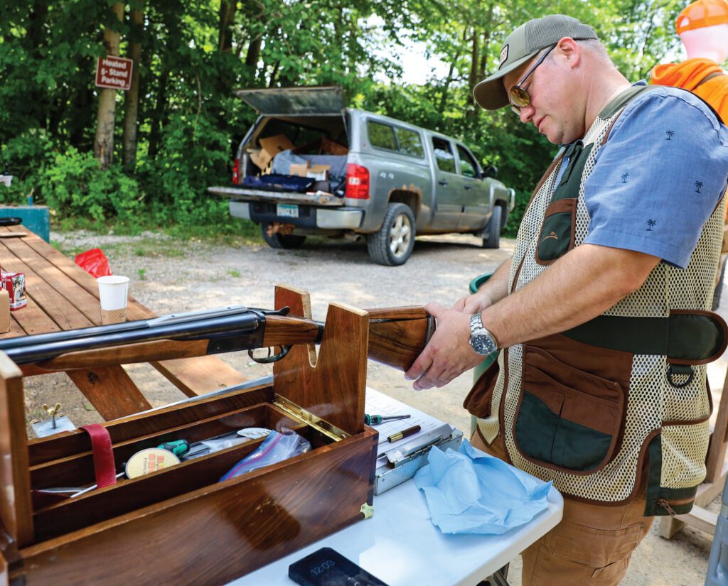 Del Whitman, works on proper gun fit at an Upland Gun Company event. 